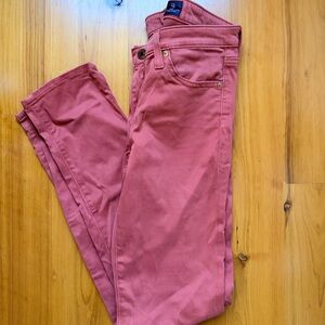 AG red straight leg pants in size 26